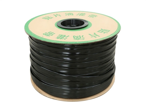 Inlaid patch drip irrigation tape